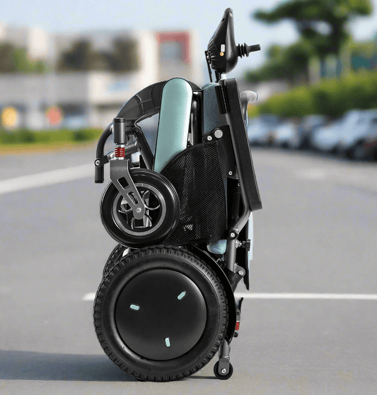 The MW9000UP electric wheelchair compactly folded, demonstrating its lightweight and travel-ready design for easy transport in a car trunk.